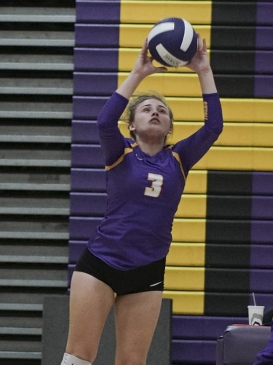 Lemoore's Kele Weedman has her eye on the ball during match against Redwood Thursday night in Lemoore.